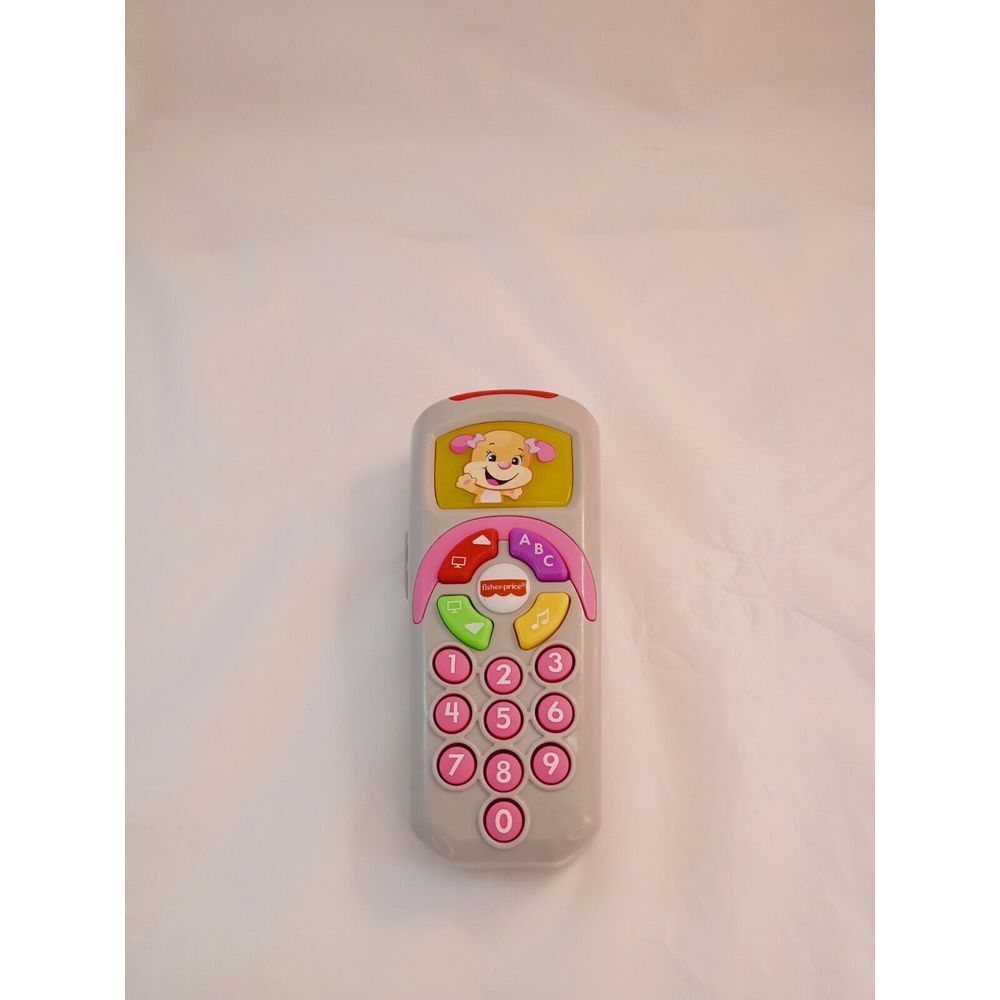 Fisher Price Laugh and Learn Puppy's Remote Baby Toy 35+โ Songs & Sounds 6-36 M